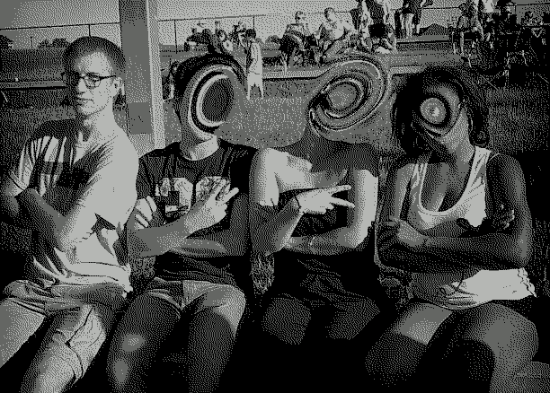 A photo of me with three other people. Faces have been obscured.