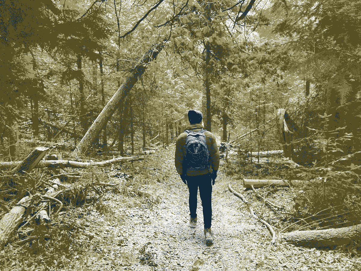 Hiking in the snow, a friend in front of me.
